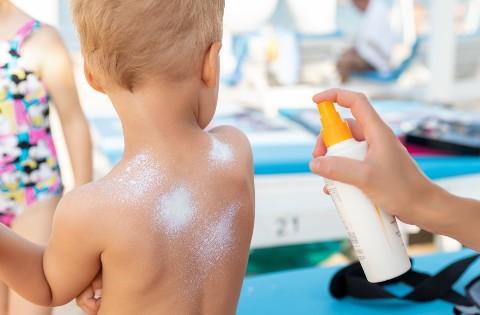 Applying sunscreen